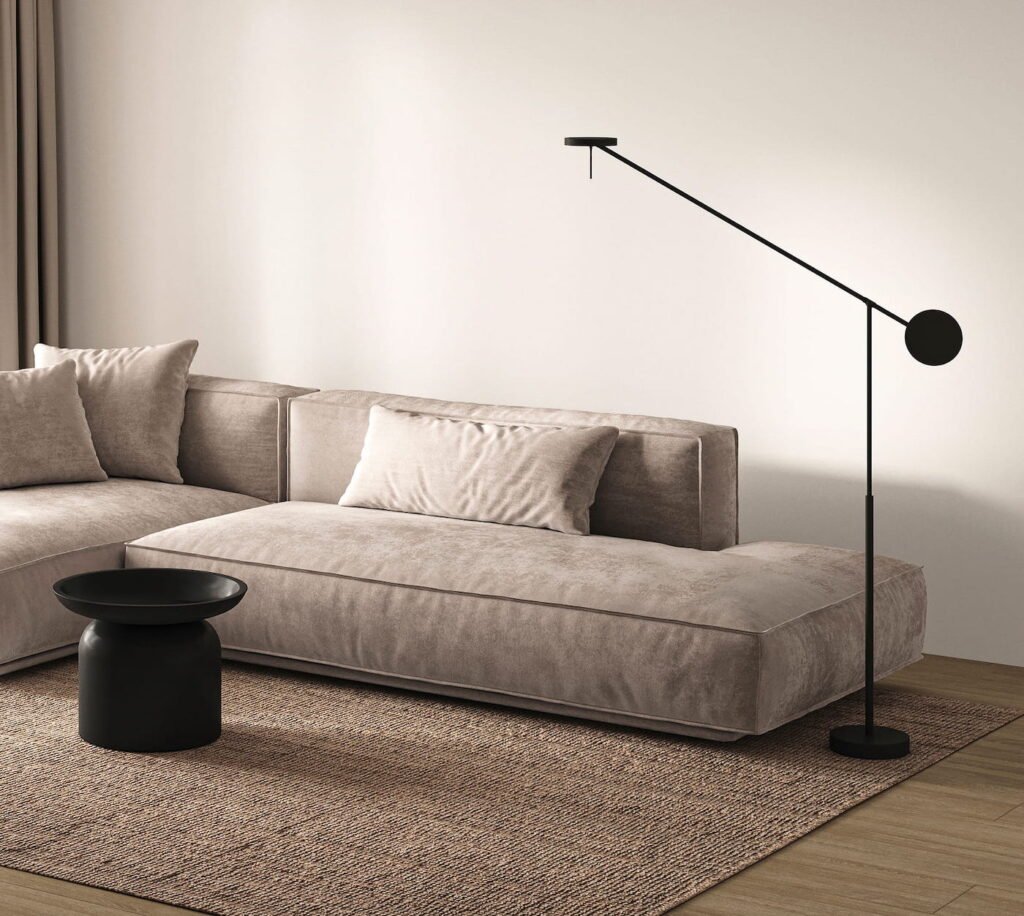 low profile japandi couch with jute rug and low hanging lamp