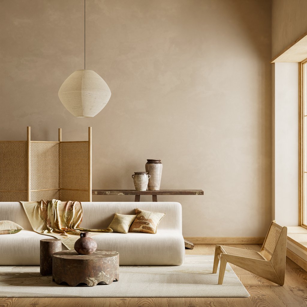 wabi sabi lounge room with low profile coach paper lanterns and muted colour tone